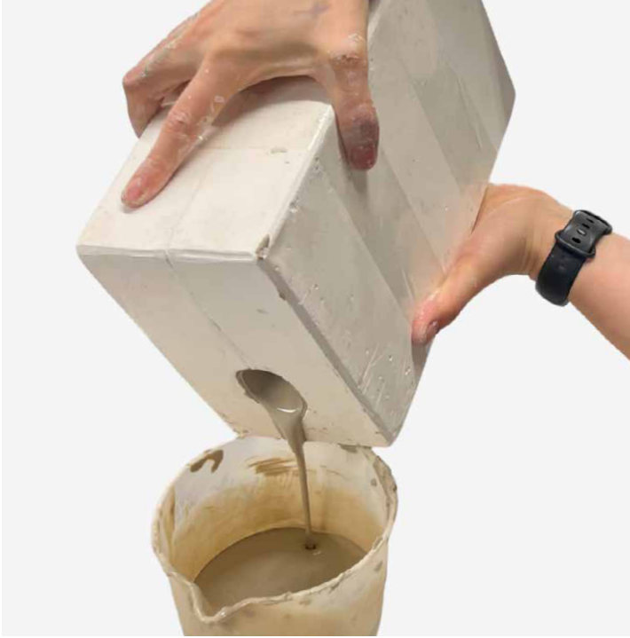 Draining excess slip from the mould
