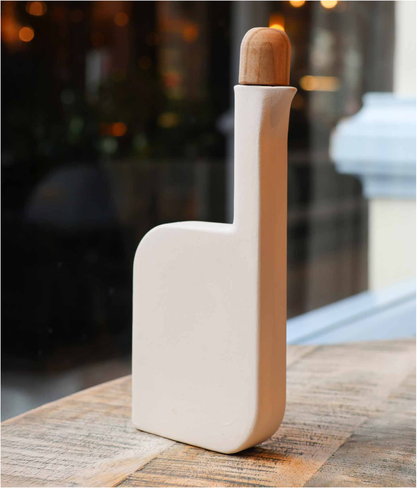 Ardea standing upright with its cherrywood stopper