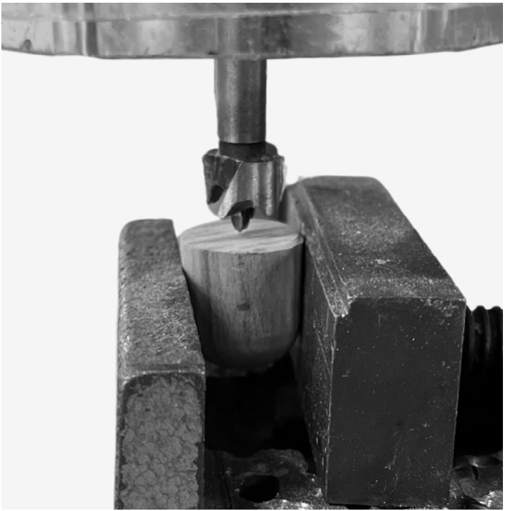 Drilling the stopper on the pillar drill