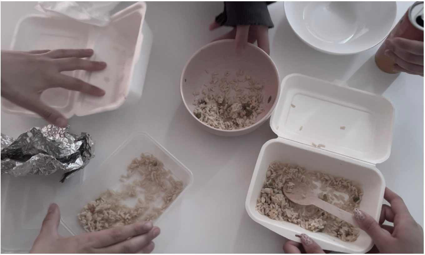 Plastic and foil takeaway containers on a table