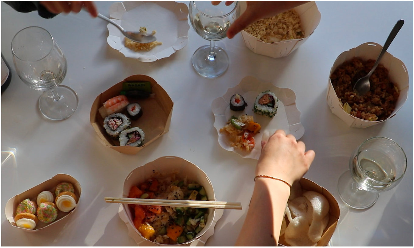Reaching for food across the table