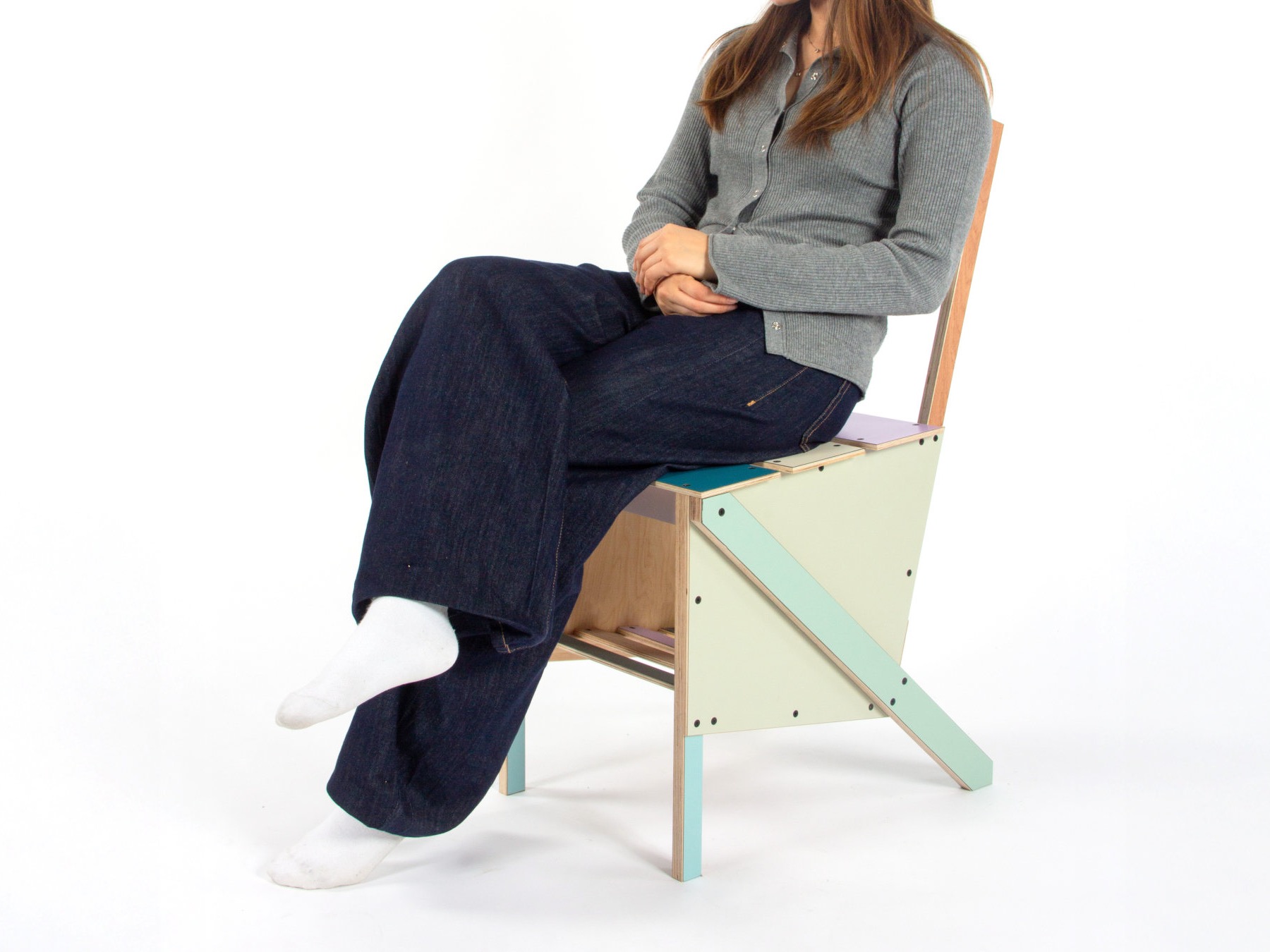 Sitting on the Second Cut chair