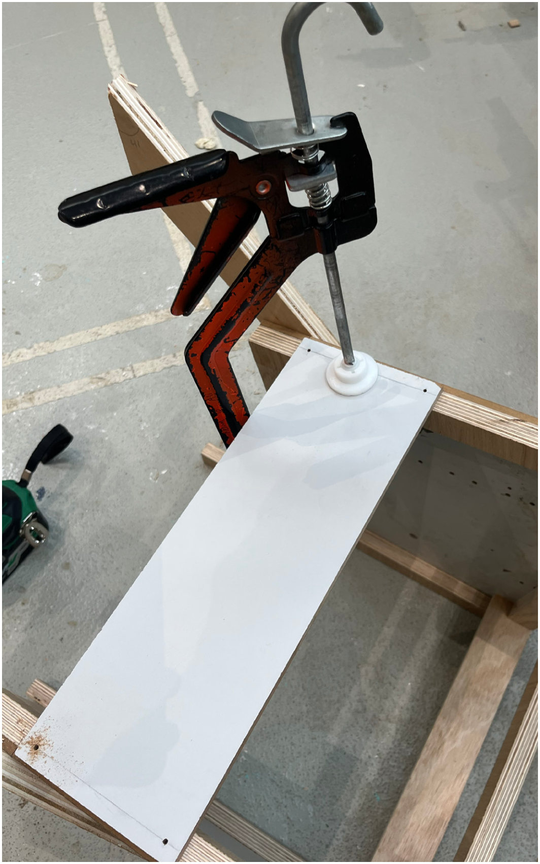 Clamping a panel before drilling