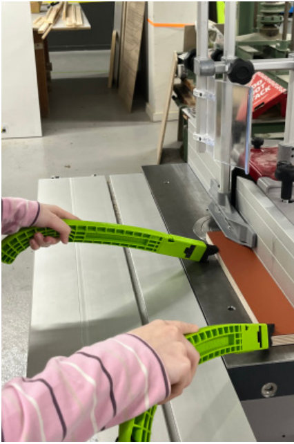 Feeding a strip through the table saw