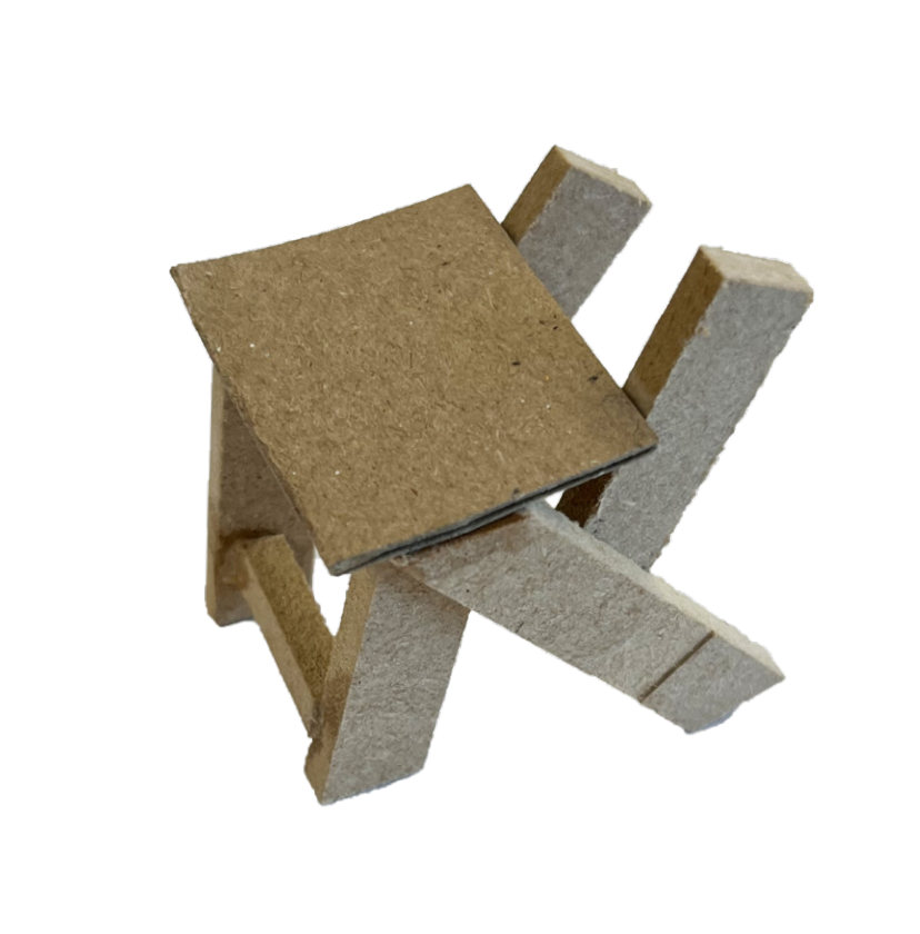 The crossed-brace joint the chair is built around