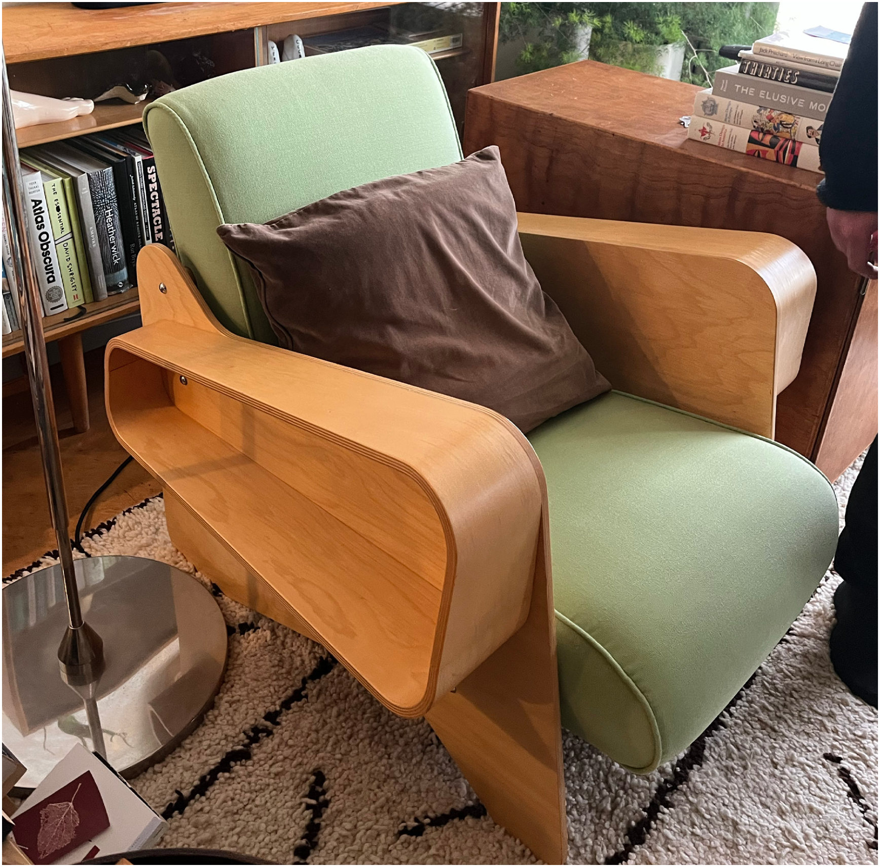 Isokon armchair with bent-ply side storage