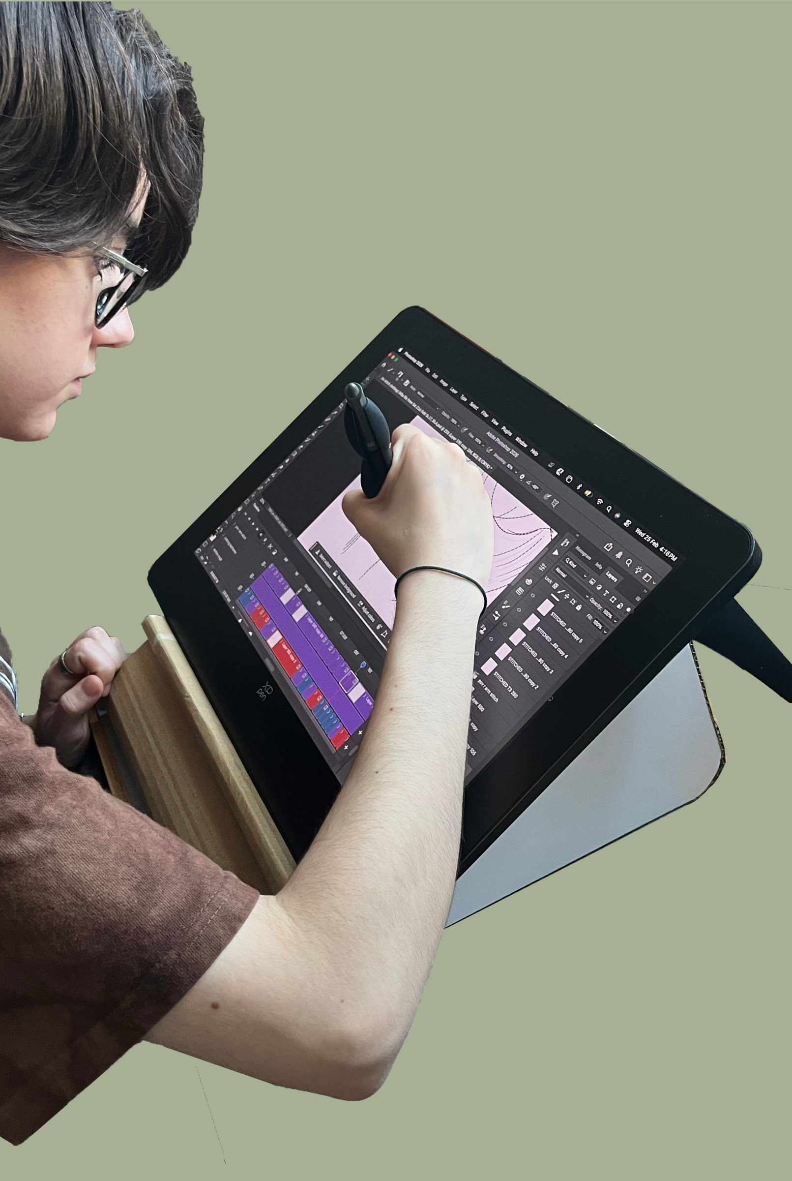 Drawing on a pen tablet resting on the stand